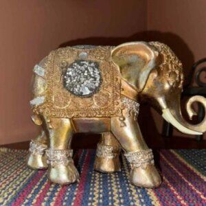 Golden Decorative Elephant Figurine with Ornate Detailing